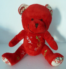 85. DOUDOU PELUCHE NOCIBE 2006 OURS INES rouge vert branche fleur T.B.ETAT