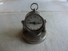 MAGNIFIQUE REVEIL LAITON CHROME SUR DEUX PIVOTS