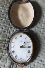 ancien réveil de voyage