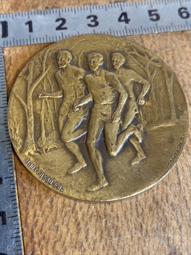 Medaille quatrième - n.,