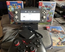 Switch Lite Grise +3 jeux en