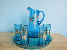 Superbe service à orangeade en verre bleu émaillé décor florale