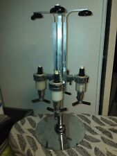 serviteur doseur à apéritif de 4 bouteilles