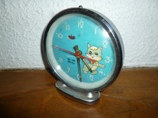 Réveil mécanique années 60 fonctionnel le chat a les yeux qui oscillent