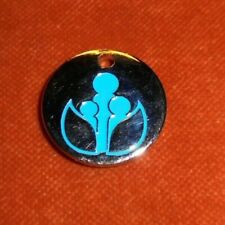 Jeton de caddie métal 1 adulte & 2 enfants entres feuilles stylisées ???