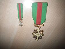 Médaille de la croix d'honneur  du mérite et dévouement Français et sa réduction