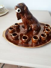  plateau avec  8 tasses a liqueur 1  pichet  chien  en  Terre cuite vernissé  