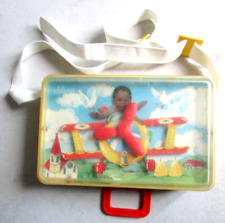 Ancien jouet d'éveil musical à tirette Chicco Hélice avion qui tourne