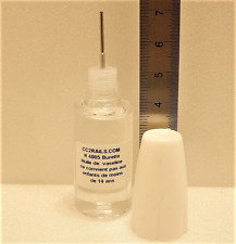 Réf  4805 UNE BURETTE D' HUILE 10 ml VASELINE EMBOUT SERINGUE HO TOUTES ECHELLES
