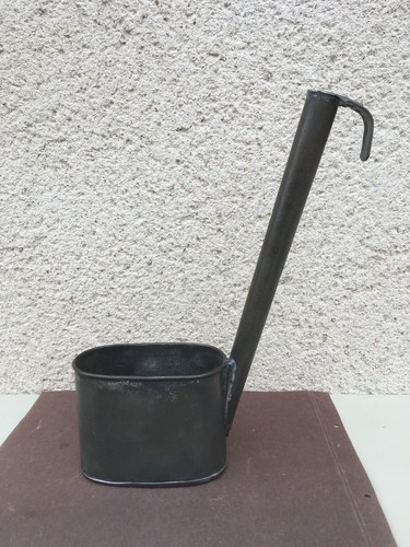 Ancienne louche eau - eau, en