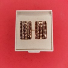 Boutons de manchette plaqués