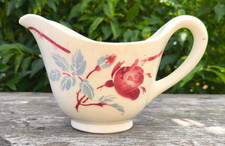 Ancienne saucière en faïence