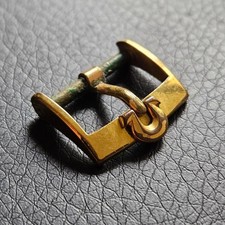 Boucle montre Oméga poinçon "plaqué or Swiss" authentique horlogerie