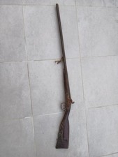 fusils anciens à crosse scultée avec double canon et à percussion