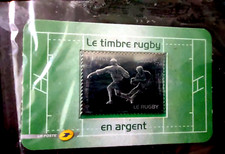 timbre  LE  RUGBY  en argent  sur carte plastifiée