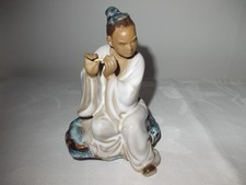 ancienne statuette asiatique en terre cuite vernissée joueur de flute 