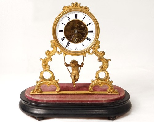 Pendule squelette bronze - , doré