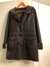 manteau fourrure mérinos cuir