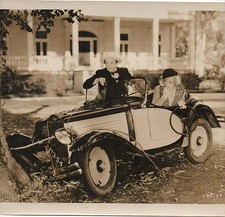 1920s Photographic Movie Still of couple in Vintage Auto Crashed into a Tree