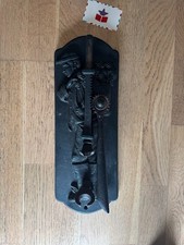 Tire-bouchon mural en fonte