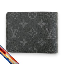 Portefeuille homme Louis Vuitton monogramme éclipse multiple à deux volets M6...