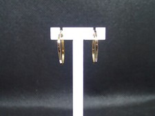 Créole ciselée en or jaune 750/ème de 0.98g  / Bijoux d'occasion