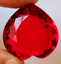 AAA + grande topaze rouge 104