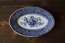 Plat ancien en faience blanc