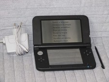 Console Nintendo 3DS XL Chocolat Marron avec chargeur et stylet.