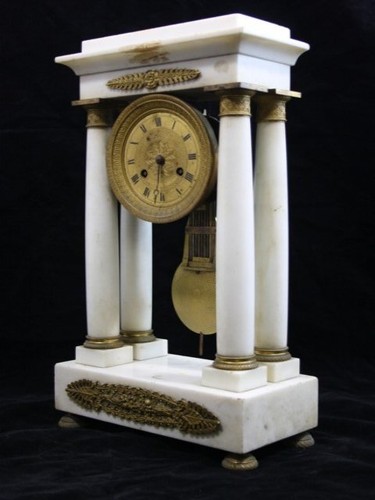 Pendule style empire en - de,