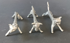 **TROIS PORTE-COUTEAUX EN ETAIN ANCIEN FORME ANIMAUX