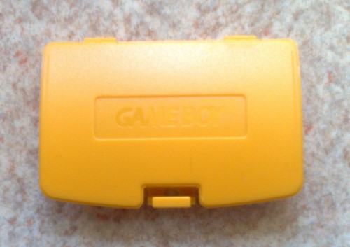 Cache pile jaune dandelion - pile,