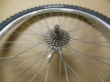 Roue  Arriére vtt  26 pouces SHIMANO ACERA-X  7 vitesses + pneu Michelin