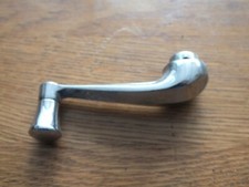 Poignée de remontoir de vitre