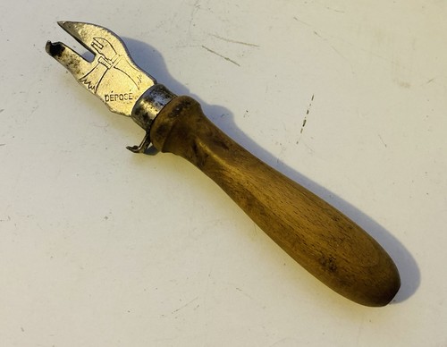 Ouvre boîte décapsuleur
