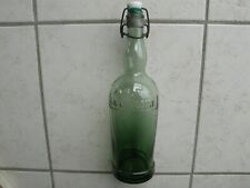 Ancienne bouteille verre teinté bouchon porcelaine"LA GAULOISE"