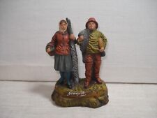 Couple de Pêcheurs en Terre