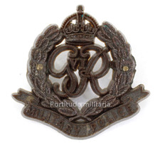 Cap badge : " Military police