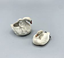 2 figurines, statuettes cygne