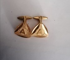 bouton de manchette or