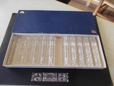 Ensemble de 12 porte-couteaux en cristal taillé, Made in Western Germany.