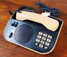 Téléphone fixe noir et beige