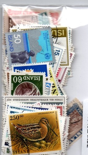 Lot 100 timbres islande - d,