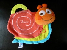 *. DOUDOU PLAT CHICCO ESCARGOT ROSE ORANGE VERT BLEU ANNEAU DENT. COEUR NEUF*