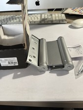 Charniéres double action