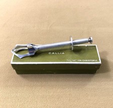 pince à sucre à système