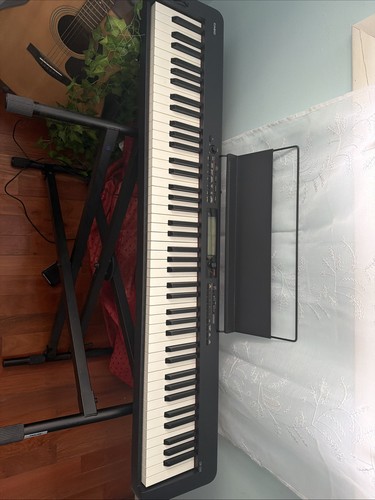Brand new piano - (, box)