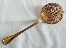 Cuillère à saupoudrer -