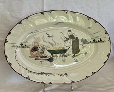 GRAND PLAT OVALE EN FAIENCE DE