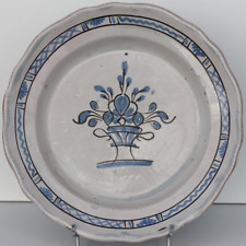 PLAT CUL NOIR EN FAIENCE -